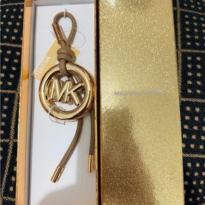 Michaels Kors Gold and Brown Pop Charm